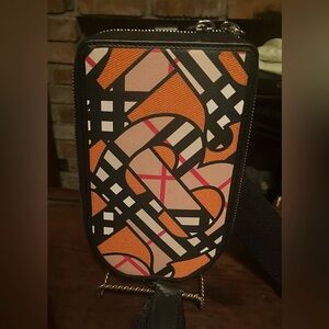 Authentic TB Monogram Novacheck phone bag with guitar strap